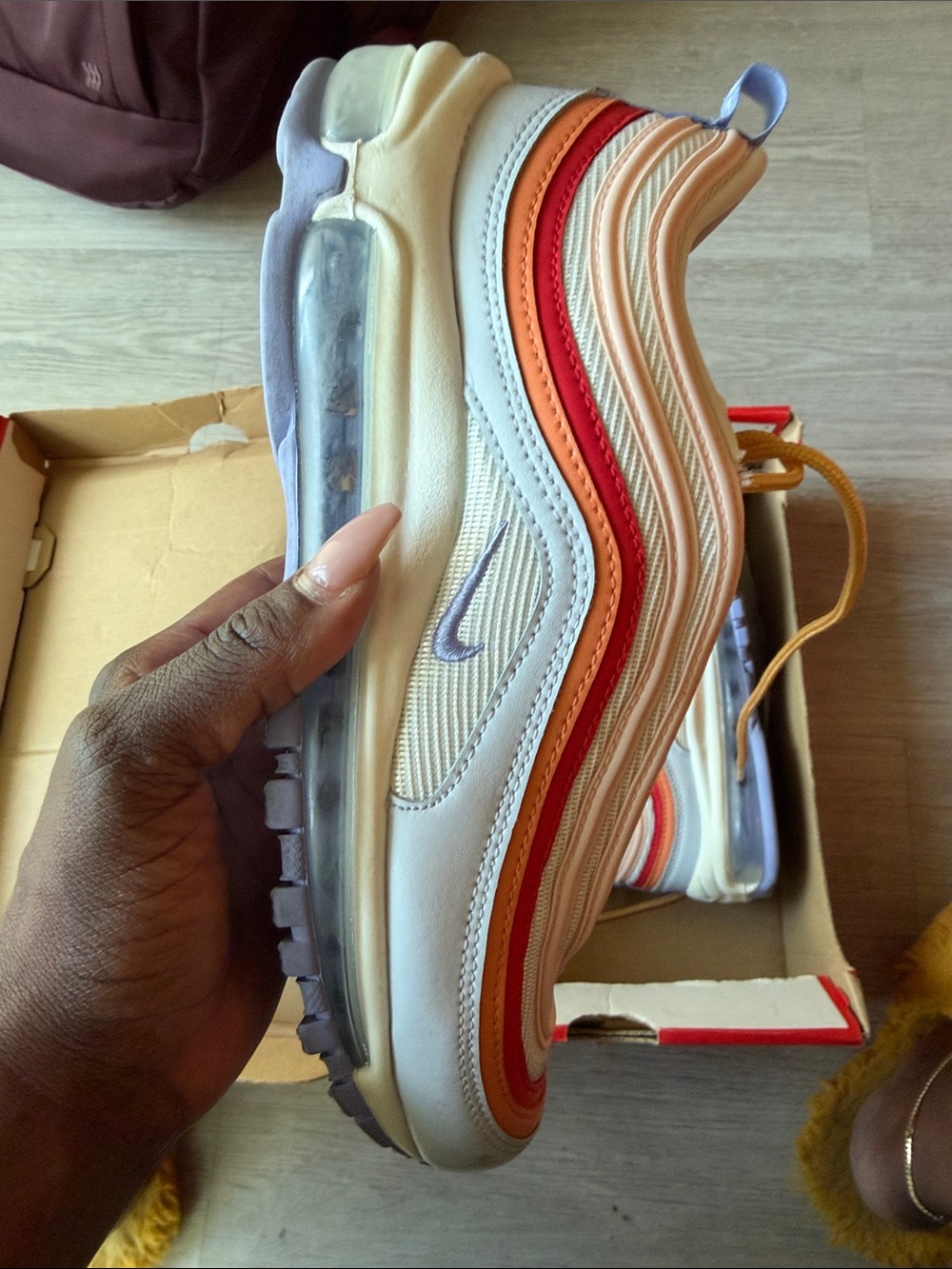 Nike Kids White Sneakers with Orange, Red & Lavender Accents